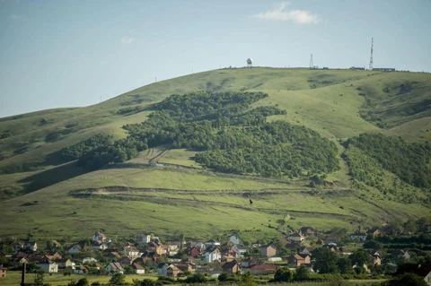 Village and hill