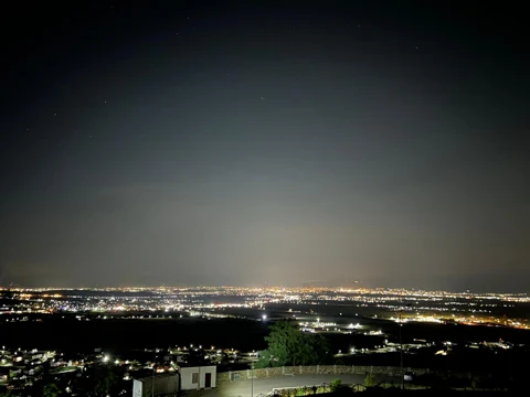 Lights beyond the hill